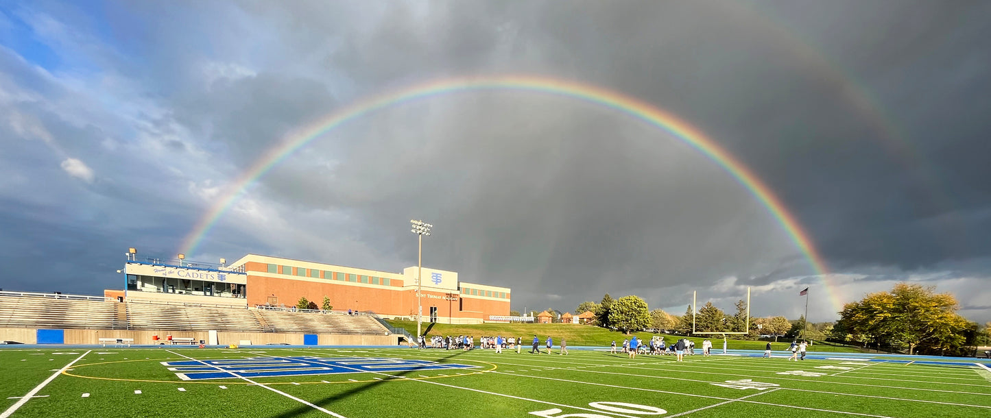 Rainbow over football field
