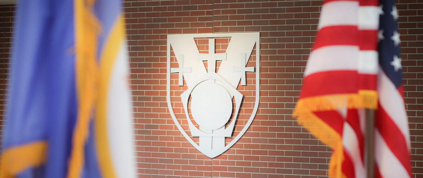 Flynn Hall Flags and Crest